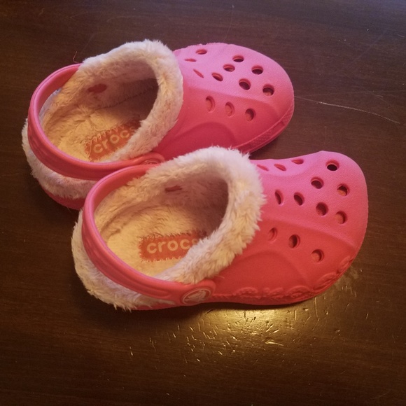 orange crocs with fur
